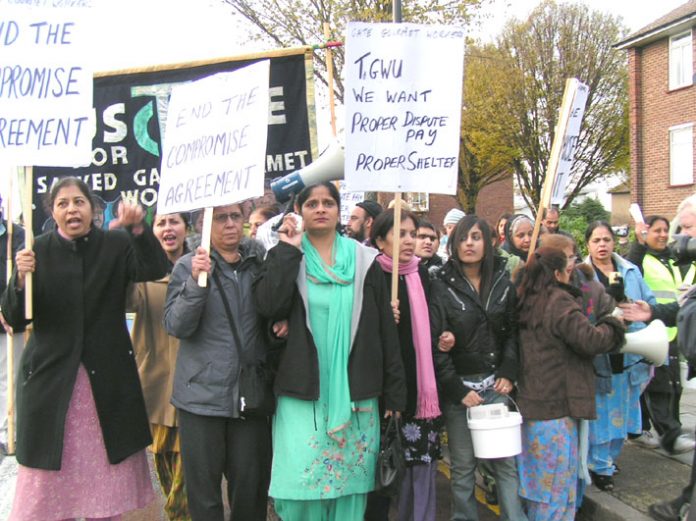 Sacked Gate Gourmet workers marching through Southall. Fellow TGWU members who worked at BA who came out on strike in support of them were told to return to work by the TGWU leaders because their supporting action was illegal