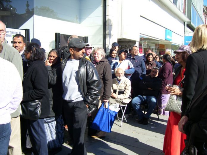 Section of the hundreds of depositors who were queuing outside Northern Rock bank in Harrow yesterday