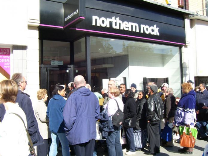 Queue outside the Northern Rock bank in Harruw on Tuesday of savers determined to take out their money