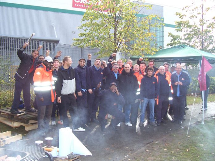 Striking postal workers at Bromley-by-Bow, E16, in a confident mood after refusing to be bullied by Royal Mail management