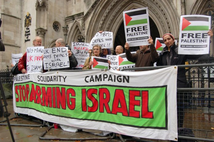 Wednesday’s picket of the High Court demanded: ‘Stop Arming Israel’