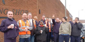 Workers at the Nine Elms Mail Centre in south-west London in determined mood