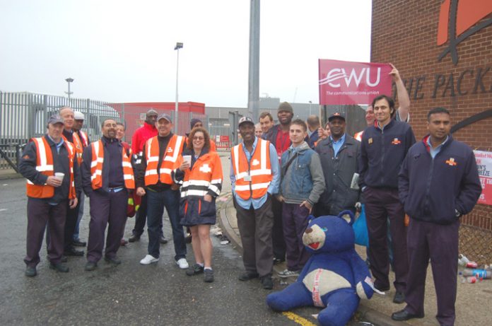 Royal Mail CWU pickets out in force at the South London Mail Centre, Nine Elms, South West London yesterday morning