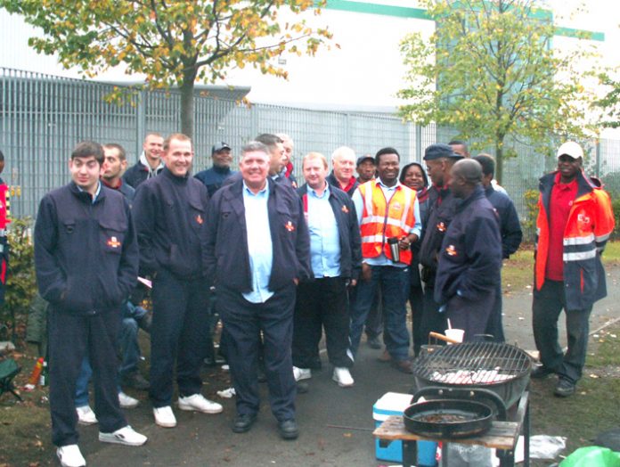 Postal workers picket the East London Mail Centre at Bromley-by-Bow during their unofficial action last Friday