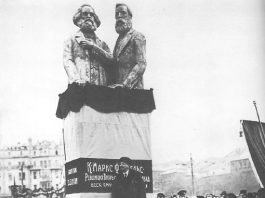 Lenin, leader of the Bolshevik Party, speaking at the dedication of a statue of Marx and Engels in Moscow in 1918, a year after the revolution
