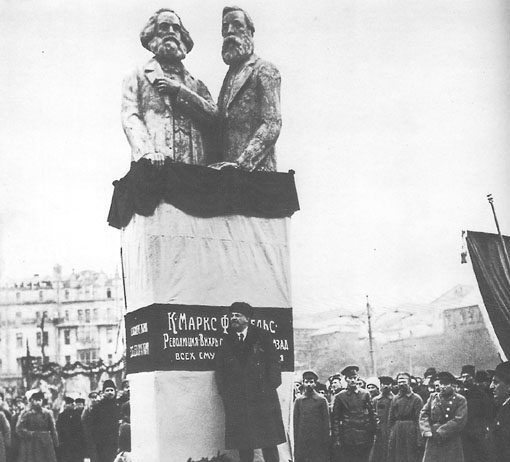 Lenin, leader of the Bolshevik Party, speaking at the dedication of a statue of Marx and Engels in Moscow in 1918, a year after the revolution
