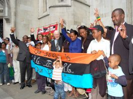 Chagos Islanders celebrate their victory outside the Court of Appeal in London on May 23