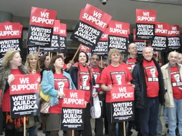 Writers, actors and directors including TIMOTHY WEST (2nd from right) and ALAN PLATER (far right) demonstrating their support yesterday on the steps of the TUC for the US screen writers strike