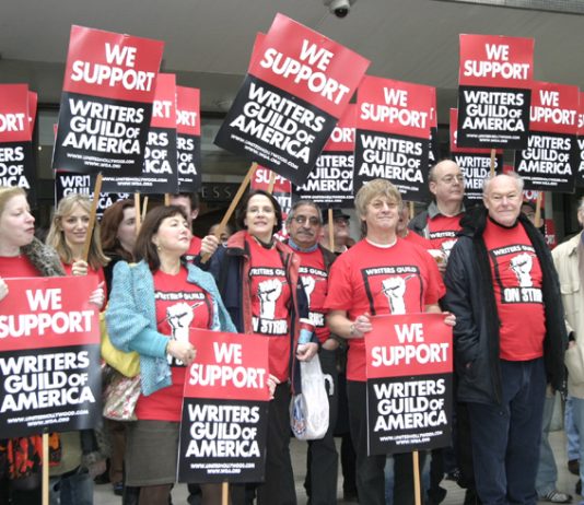 Writers, actors and directors including TIMOTHY WEST (2nd from right) and ALAN PLATER (far right) demonstrating their support yesterday on the steps of the TUC for the US screen writers strike