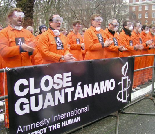 Protest outside the US embassy in London on January 11th this year, 5 years since the first prisoner was interned in Guantanamo Bay
