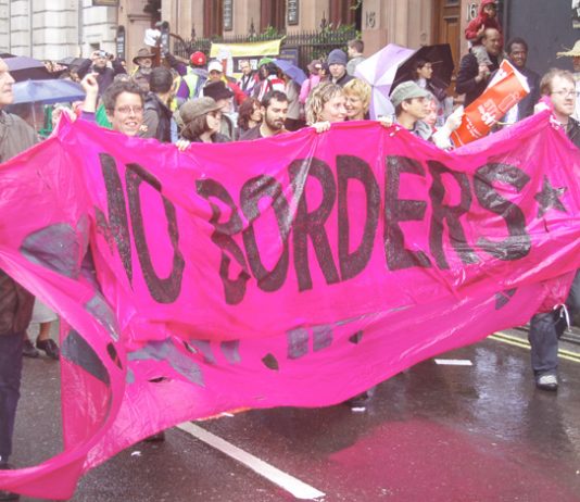 ‘No Borders’ banner on the ‘Strangers into Citizens’ demonstration on May 7th