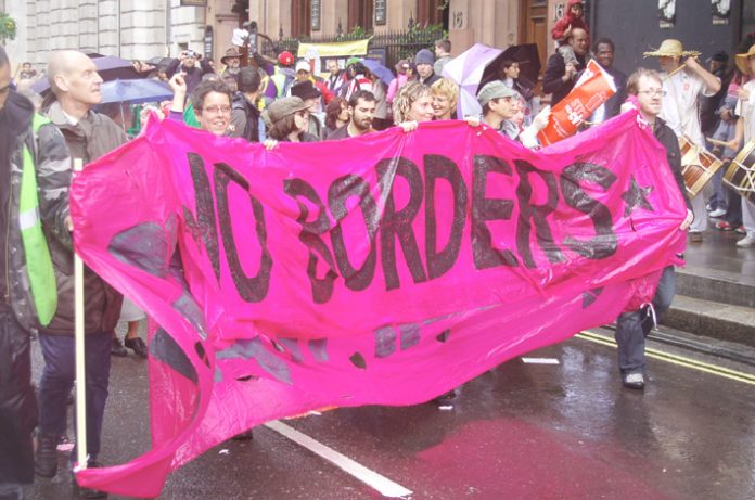 ‘No Borders’ banner on the ‘Strangers into Citizens’ demonstration on May 7th