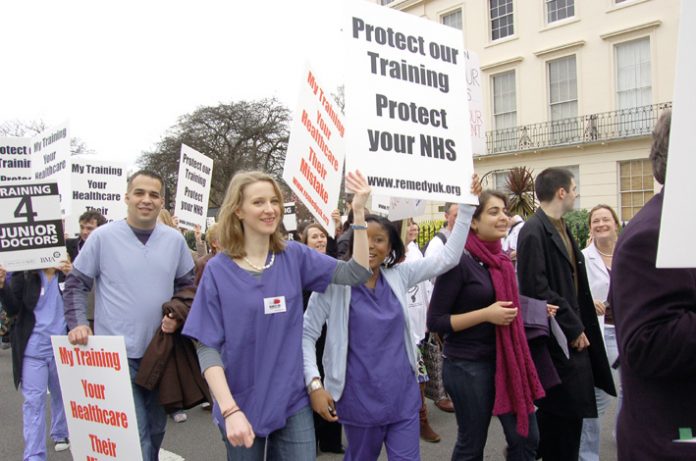 Junior doctors, members of the BMA, demonstrate against the government imposed Medical Training Application Service leaving thousands without posts. The latest government move threatens GPs