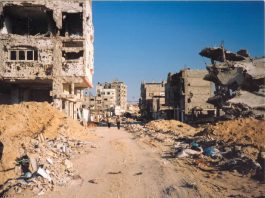 Israel Launches A Wave Of Strikes On Gaza Buildings in the centre of Khan Younis destroyed by Israeli bombardment