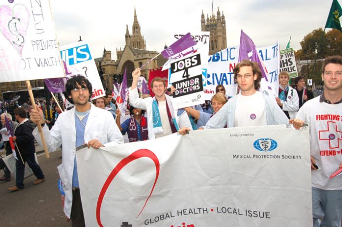 Junior doctors marching in defence of the NHS in November last year  – face more sackings under Brown’s Blairite plan