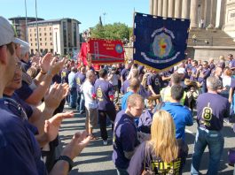 Fire Service Cuts And Station Closures Threatening Public Safety Humberside and Tayside FBU banners on a national FBU demonstration in Liverpool