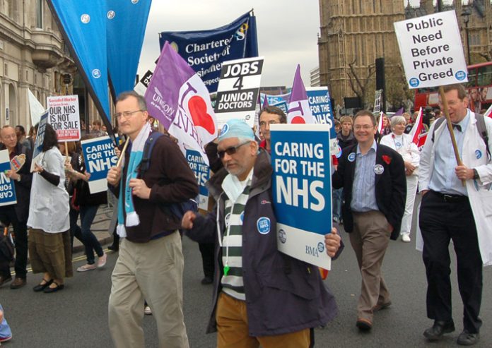 NHS trade unionists marching in London on November 3rd to defend the NHS against the privateers