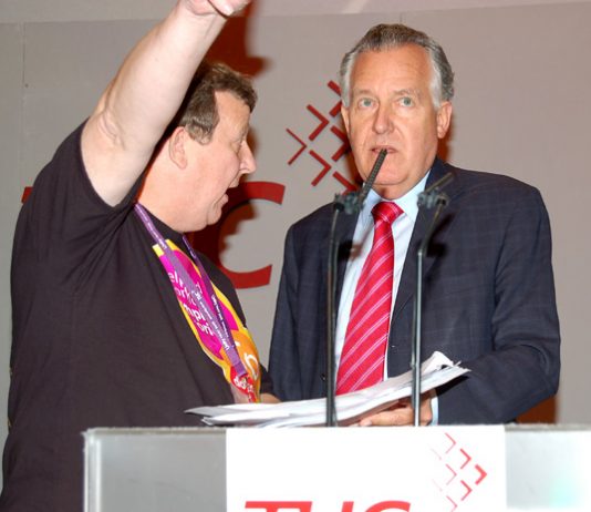 PETER HAIN being confronted by Remploy convenor PHIL DAVIES protesting against Remploy factory closures  at the TUC Conference last September