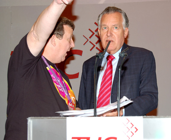 PETER HAIN being confronted by Remploy convenor PHIL DAVIES protesting against Remploy factory closures  at the TUC Conference last September