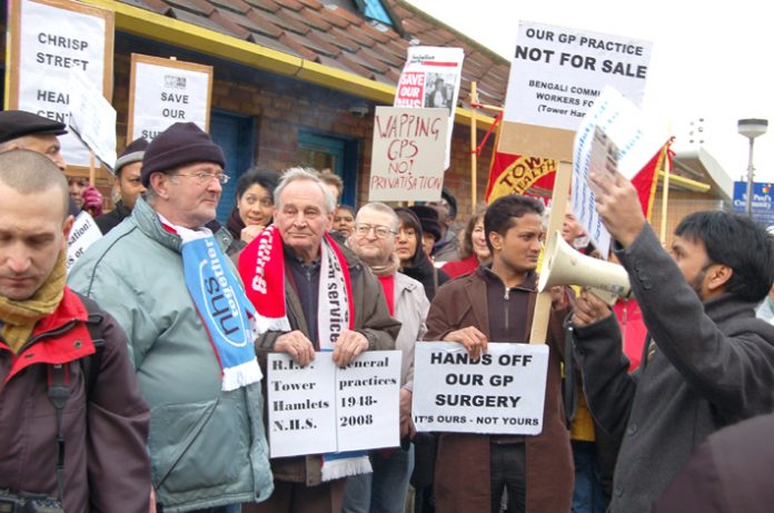 GPs, local residents and trade unionists rally against the privatisation of St Paul’s Way surgery in Bow on January 31