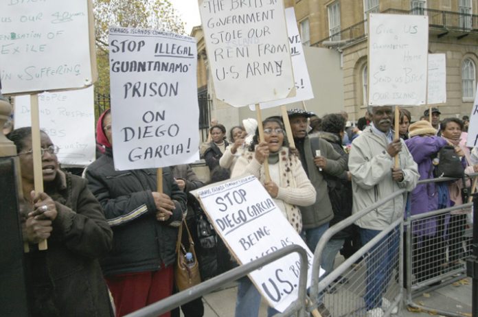 Chagos Islanders demonstrating outside Downing Street last November demanding the right to return to their islands  and the expulsion of the US base from Diego Garcia, the largest of them