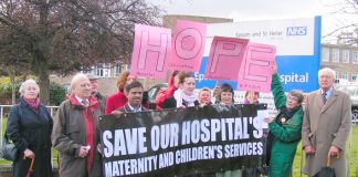 Campaigners outside Epsom Hospital on Friday  morning demanding a halt to closure plans