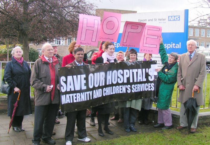 Campaigners outside Epsom Hospital on Friday  morning demanding a halt to closure plans