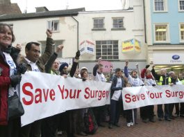 Over fifty GPs, surgery staff and their relatives urged Rugby residents to ‘Save Your Surgery’