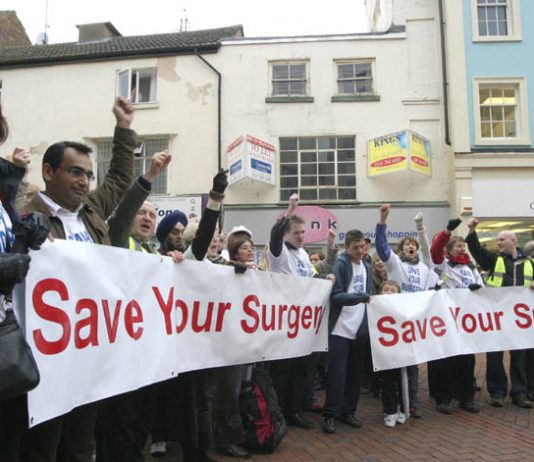 Over fifty GPs, surgery staff and their relatives urged Rugby residents to ‘Save Your Surgery’