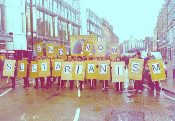 Communication Workers Union  members with a clear message at the front of the Belfast demonstration on January 18th 2002 after a young postal worker was shot dead by loyalists