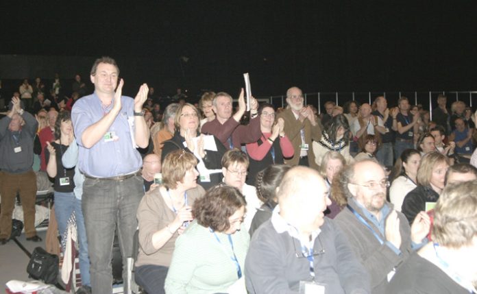 Delegates at the NUT conference show their support for action to defend wages and jobs