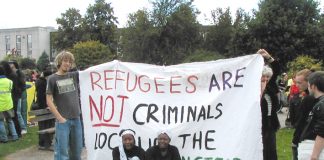 Refugees are not criminals – say demonstrators protesting against plans to build a new immigration detention centre at Gatwick