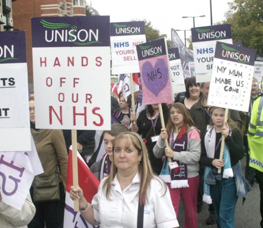 Midwives, nurses and other health workers marched in their thousands against the privatisation of the NHS last November