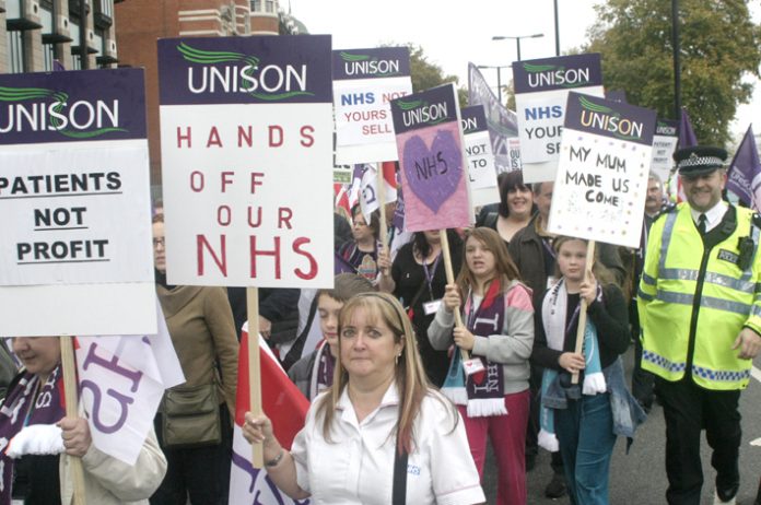 Midwives, nurses and other health workers marched in their thousands against the privatisation of the NHS last November