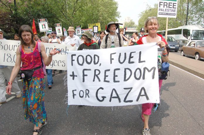 Marchers in London last Saturday  demanding the lifting of the Israeli siege of Gaza