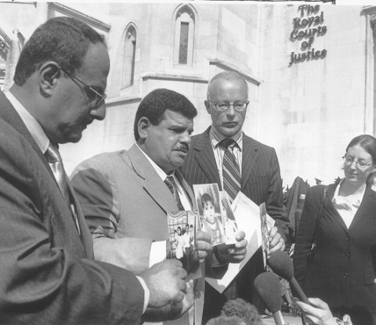 KIFA  MUNTARI (left, now deceased) and Baha Mousa’s father DAOUD MOUSA (second left) with lawyers at the High Court in London in 2004, after his son’s brutal death at the hands of British troops in southern Iraq