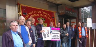 Determined postal workers on the picket line during strike action across Royal Mail last year against pay cuts and attacks on their conditions of service