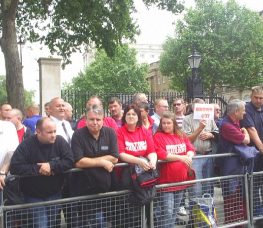 Road hauliers and their families across the road from Downing Street yesterday afternoon