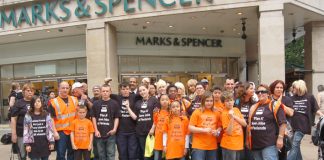 Angry Fenland Foods workers with their families demonstrating outside the Marks & Spencer store in Oxford Street against the threat tonearly 800 jobs