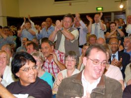 ‘NAME THE DATE FOR COORDINATED STRIKE ACTION’ – urges Prisoners Officers Association leader Many trade unionists stood to applaud when Brian Caton said the POA would defy a government strike ban against prison officers and called on all the public sector unions to join them in a one-day strike