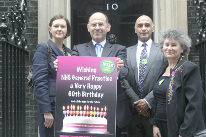 BMA GPs committee member BETH McCARRON-NASH, GPs committee chairman Dr LAURENCE BUCKMAN, GPs committee member Dr PRIT BUTTAR, and BMA Patient Liason Group member NATALIE TEICH before handing in a 1,236,085-signature petition to Downing Street