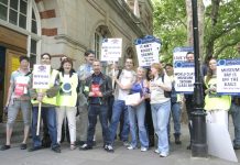 Pickets outside the Science Museum, South Kensington yesterday striking to defend their pay