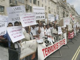 Demonstrators in London opposing the visit of Sri Lankan Premier Rajapakse
