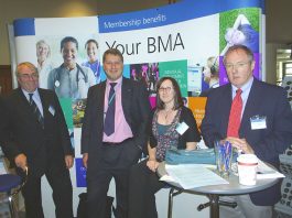 A group of BMA representatives happy at the stand their conference is taking in defence of the NHS
