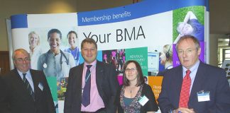 A group of BMA representatives happy at the stand their conference is taking in defence of the NHS
