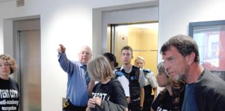 Protestors against the proposed Wembley Academy occupied the London HQ of ARK – the proposed sponsors – who called security guards and the police. The occupiers were elated that they managed to get into the heavily secured building.  Photo credit: GUY SMA