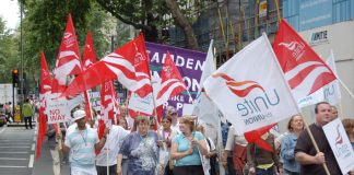 Unite members marching against pay cuts during July’s national strike by local government workers