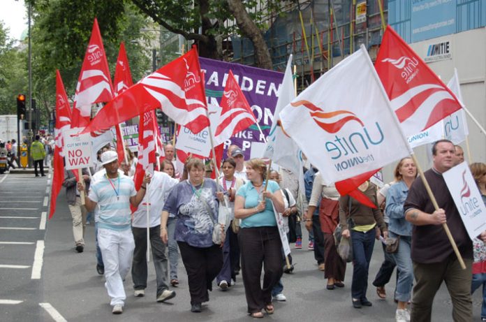 Unite members marching against pay cuts during July’s national strike by local government workers