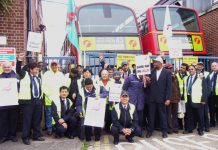 Striking bus workers fighting for fair pay outside Alperton bus garage yesterday morning
