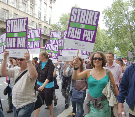 Striking council workers marching against the Brown government’s pay cuts in London in July